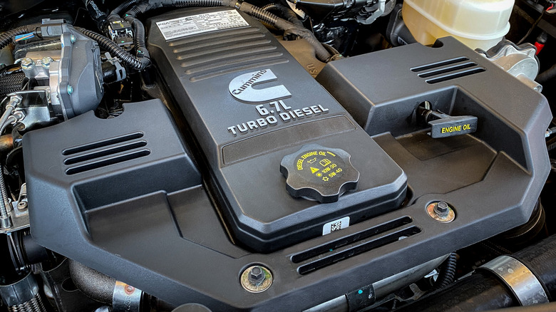 Shot of the 6.7-liter Cummins turbodiesel engine nestled beneath the hood of a Ram heavy-duty truck