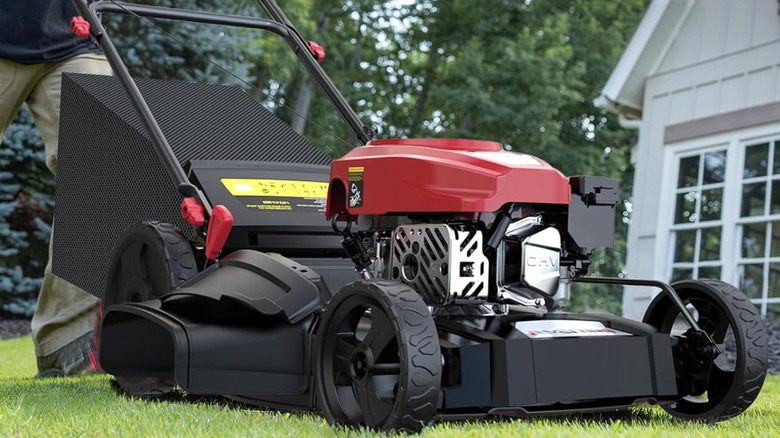Person using Amerisun lawn mower