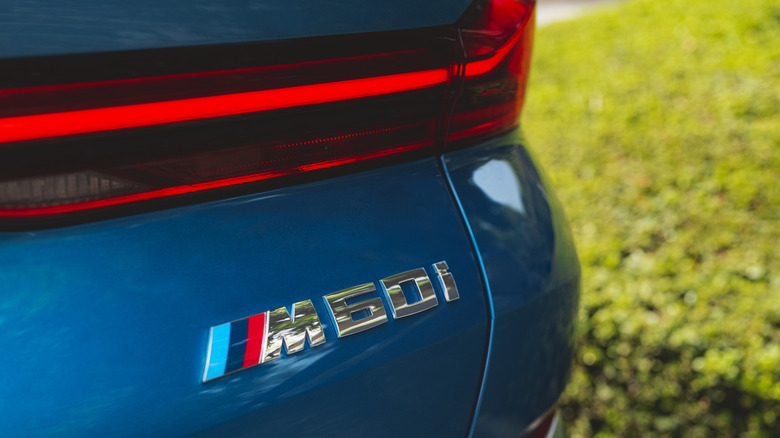 Close-up of BMW X6 M60i badge