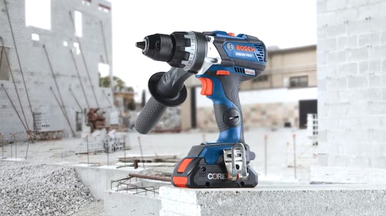 Bosch hammer drill sitting on concrete at construction site