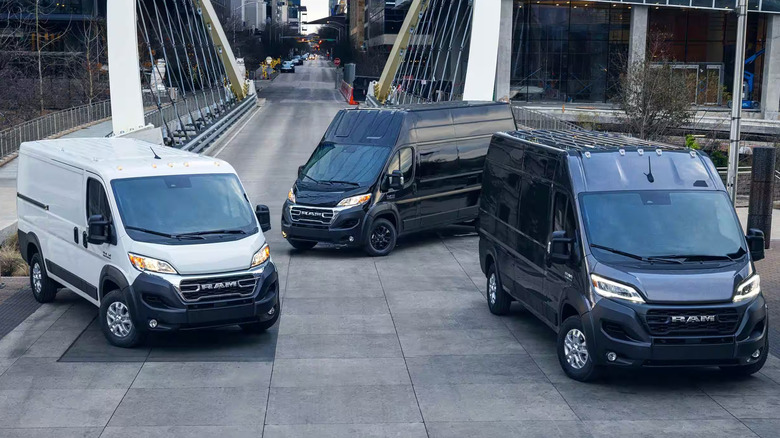 three Ram ProMasters on street