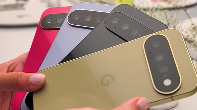Google Pixel 11 lineup fanned out in hand
