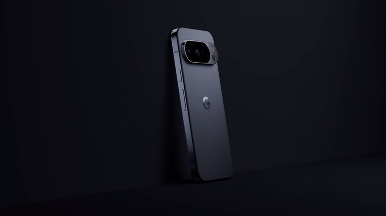 A black/gray Google Pixel 10 Pro leaning on a black background