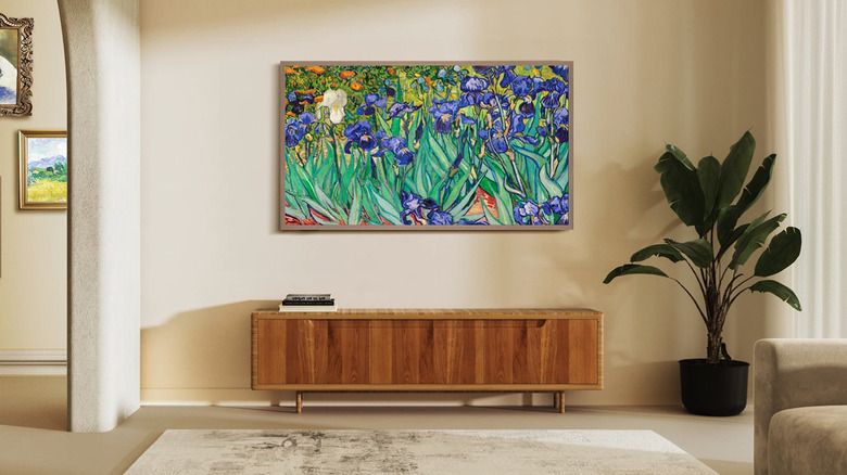 Hisense Canvas TV hanging on living room wall