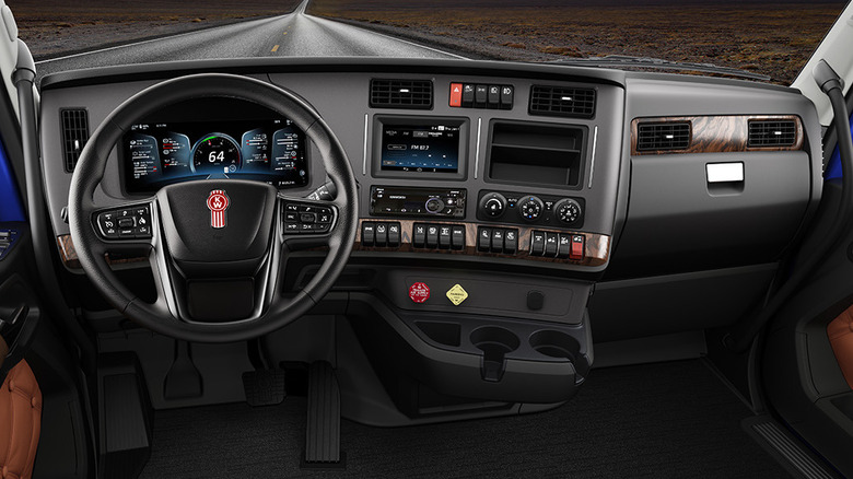 Front facing shot of the dashboard and cabin of the Kenworth T680