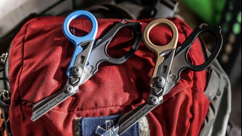 Leatherman raptors on top of bag