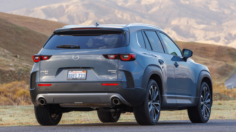 Rear shot of a gray Mazda CX-50