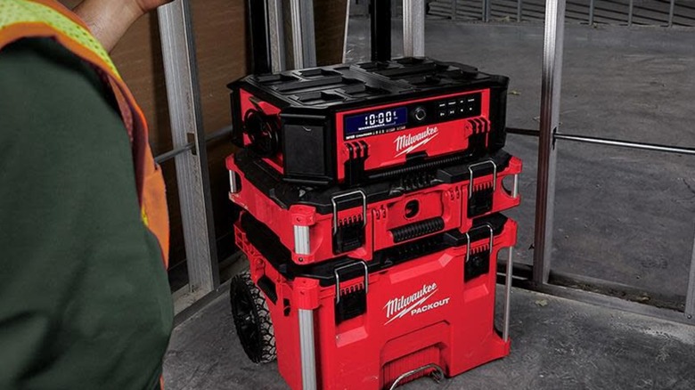 Milwaukee Packout Radio stacked on rolling toolbox