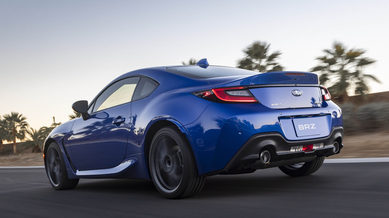 blue Subaru BRZ driving