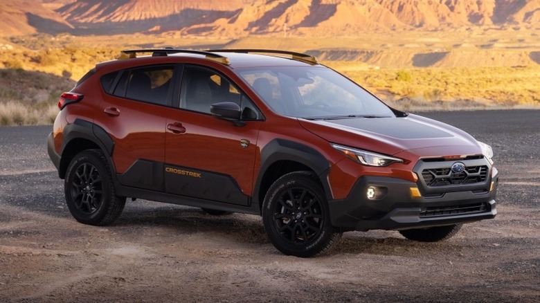 Front 3/4 static shot of a parked 2024 Crosstrek Wilderness