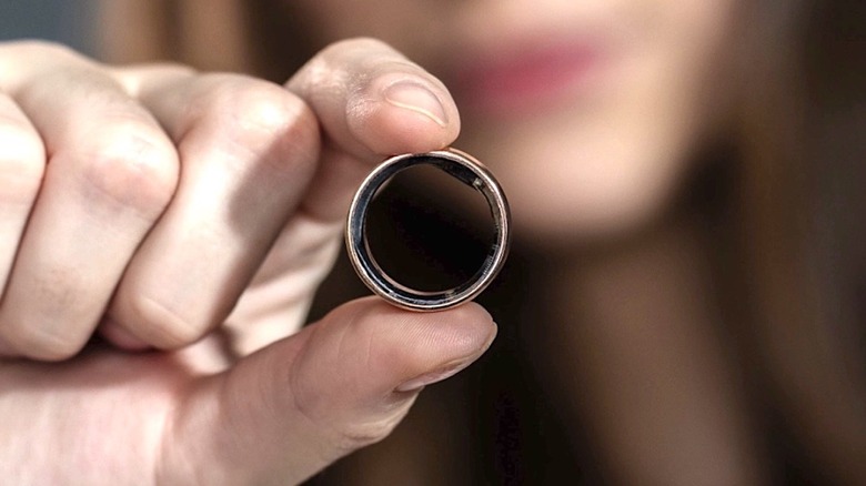 Person holding an Ultrahuman ring