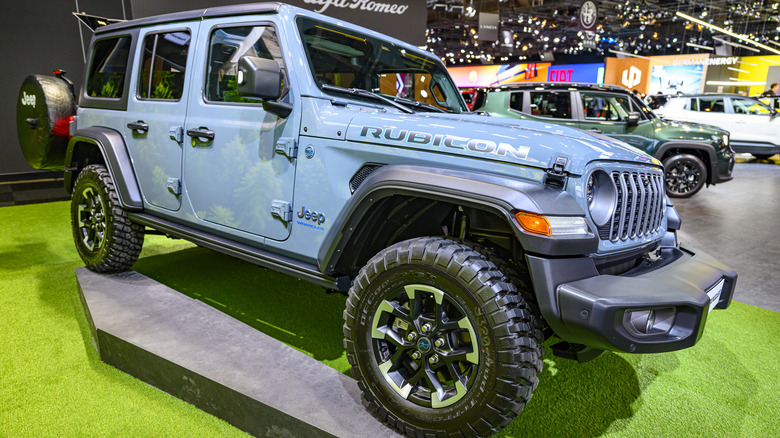 A blue Jeep Wrangler Rubicon on display.
