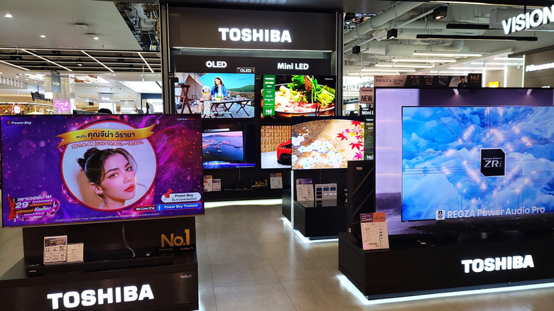 TOSHIBA OLED and Mini LED TVs at an exhibition