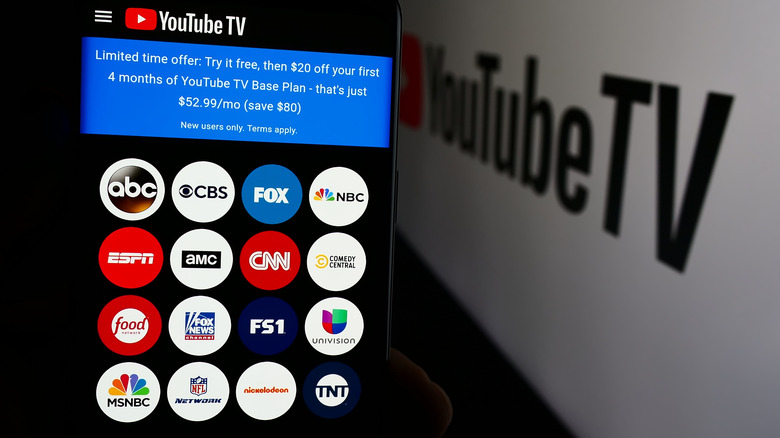 YouTube TV on a smartphone screen with a list of channels.