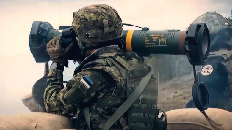 Soldier holding a Spike anti-tank guided missile launcher