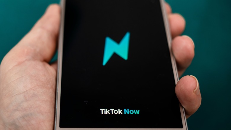 TikTok Now logo smartphone
