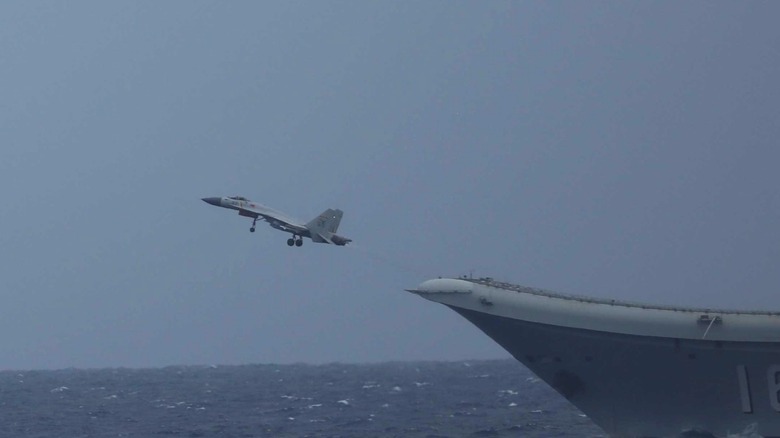 Several J-15 T fighter jets flying in the sky