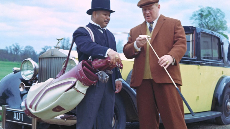 OddJob and Goldfinger and Rolls-Royce Phantom 3 in "Goldfinger"