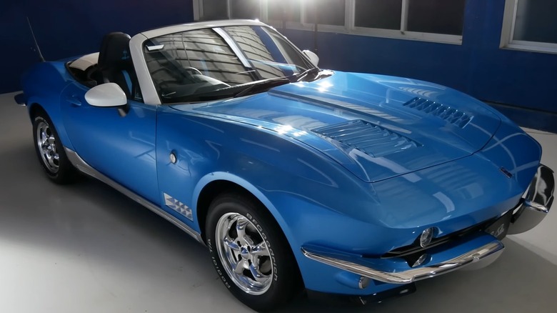 Front 3/4 view of blue Mitsuoka Rock Star