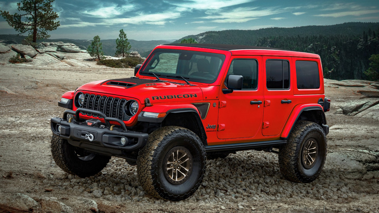Red 2024 Jeep Wrangler Rubicon 392 on elevated rocky landscape