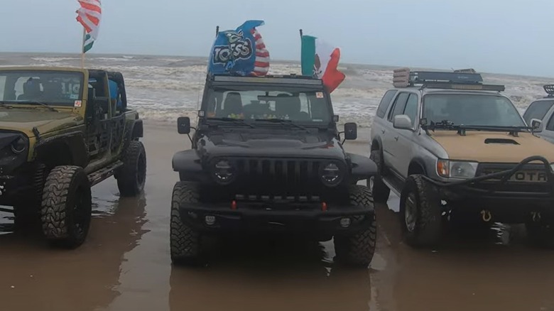 Jeep vehicles on beach