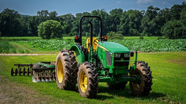 A John Deere 5075E tractor working at a farm in the U.S.