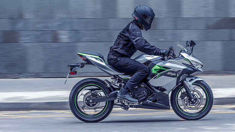 Rider on a Kawasaki E-1 in the city