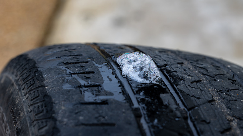tire leak with soap bubbles