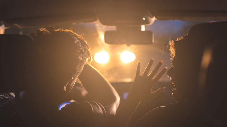 Headlights shining at oncoming traffic