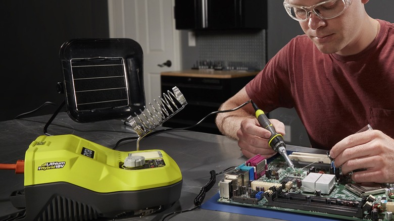 Ryobi 18V ONE+ 45W Hybrid Soldering Station used on a motherboard.