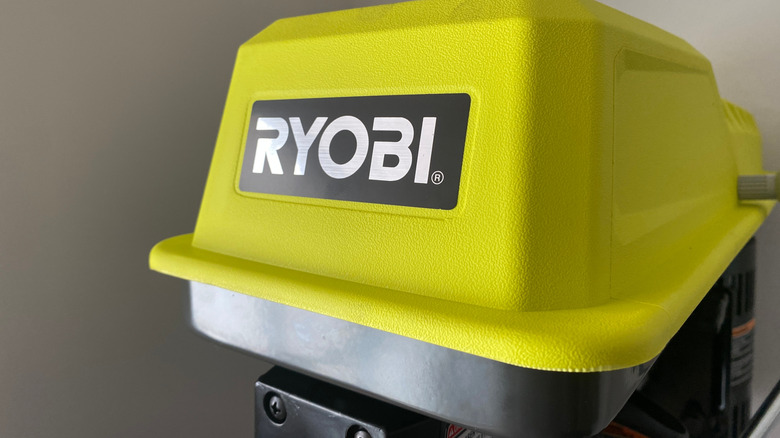 closeup of the Ryobi logo on a Ryobi tool.