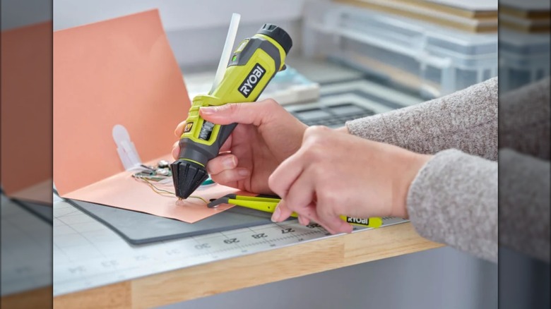 Ryobi's USB Lithium Glue Pen Kit being used.