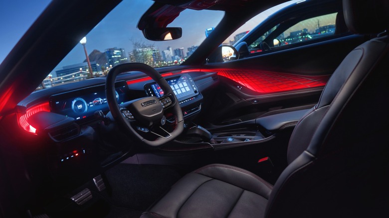 An Interior shot of Dodge Charger Daytona featuring a driver's seat and dash layout