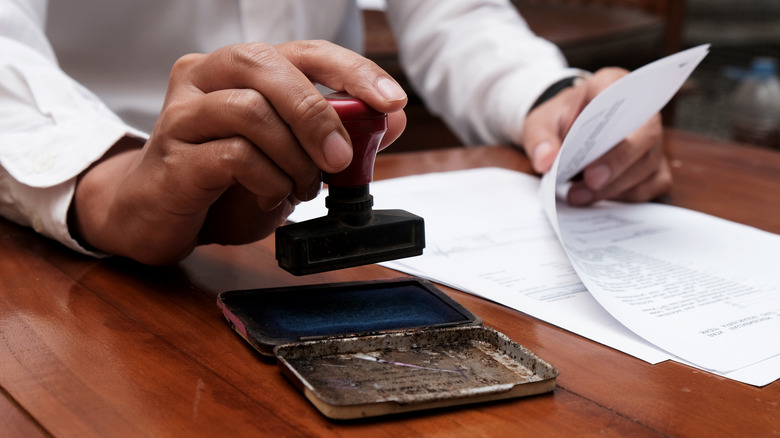 A bill getting a stamp applied