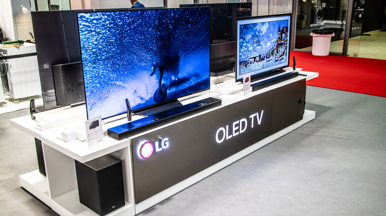 LG OLED TVs on display at an electronics show
