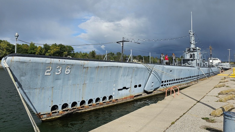 USS Silversides docked under a cloudy sky
