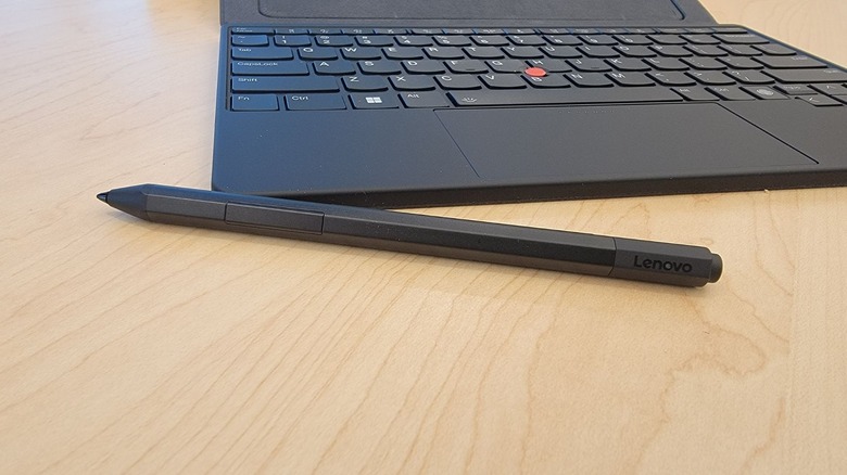 lenovo precision pen in front of thinkpad x1 fold
