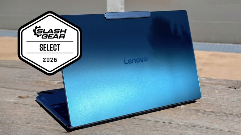The Lenovo Yoga Slim 9i 14 Gen 10 with its lid open showing the shiny top with the lid open.