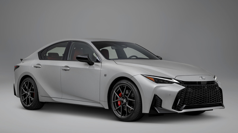 Front right view of white Lexus IS350 in studio