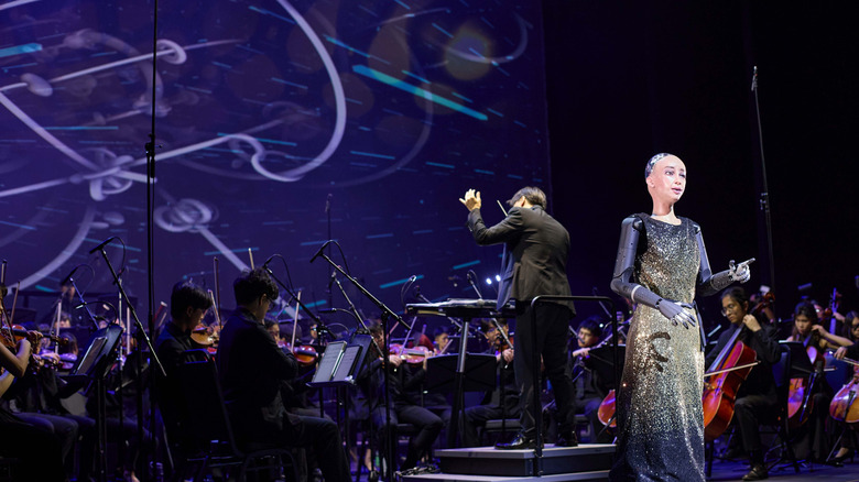 sophia the robot singing at concert