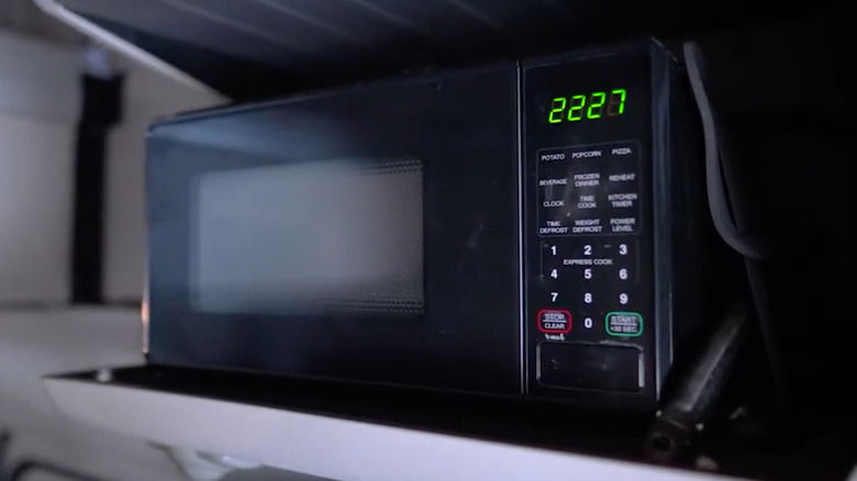 close up view of a microwave oven in a semi-truck
