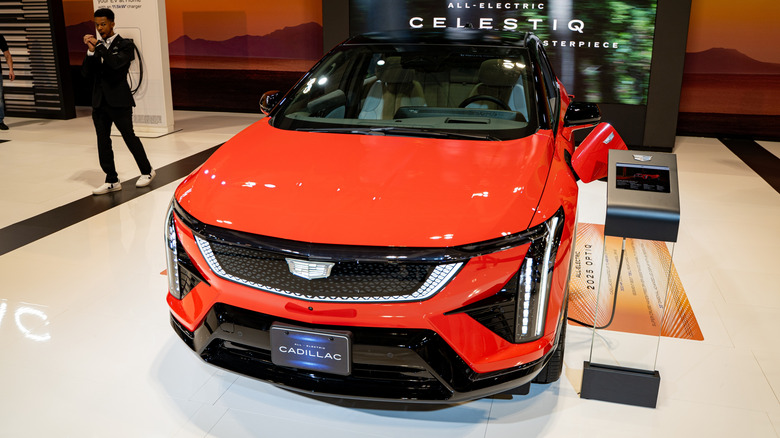 Red Cadillac Optiq on display at a car show
