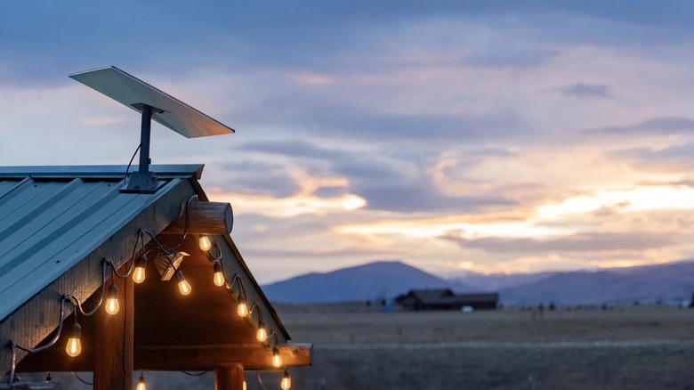 Starlink dish on a rural roof in the mountains
