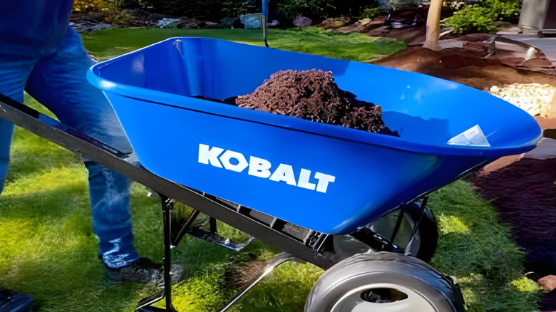 Wheelbarrow being moved