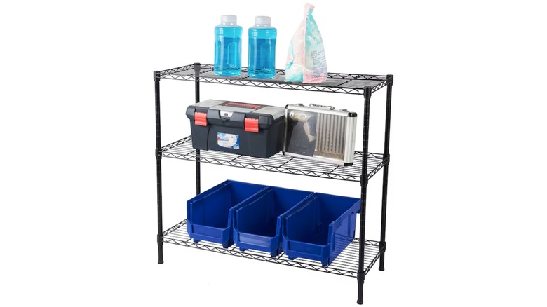 Lowe's shelving unit holding garage items