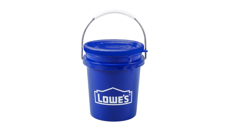 Blue Lowe's miniature bucket against white background