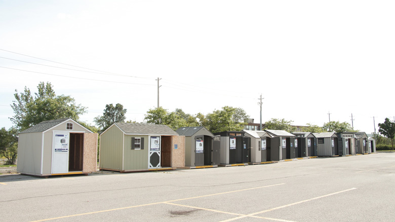 a row of sheds for sale