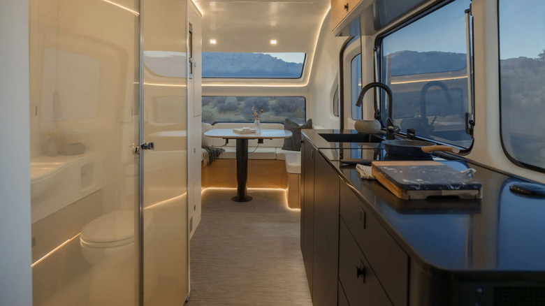 The Pebble Flow travel trailer in orange paint