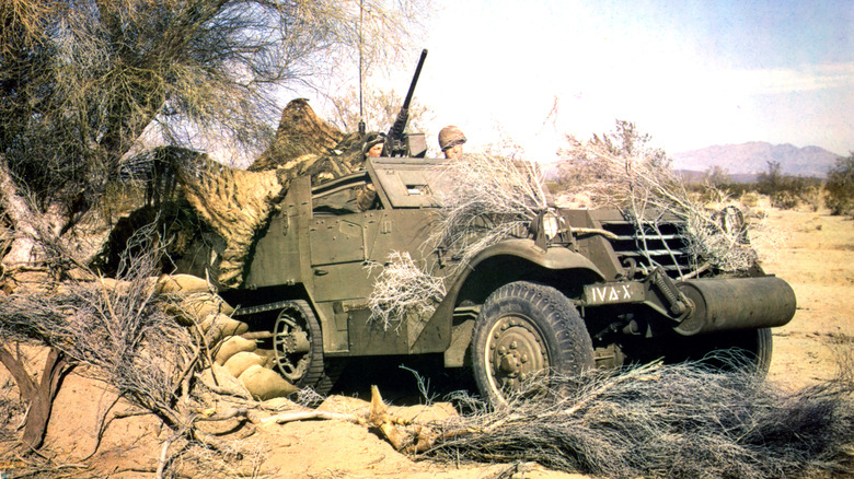 Green half-track vehicle