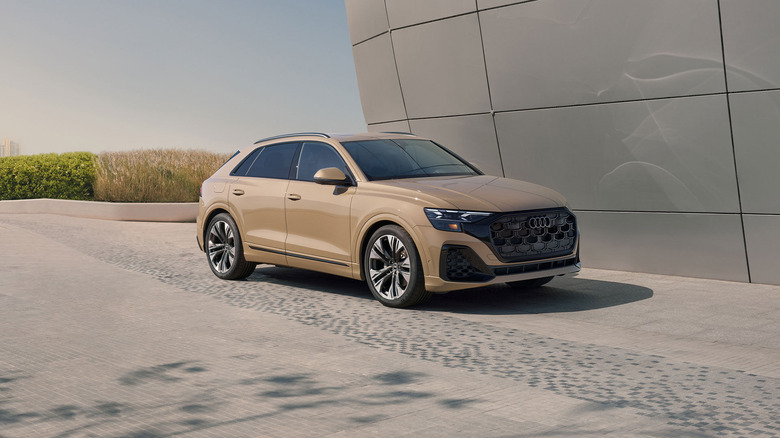 A brown Audi Q8 parked